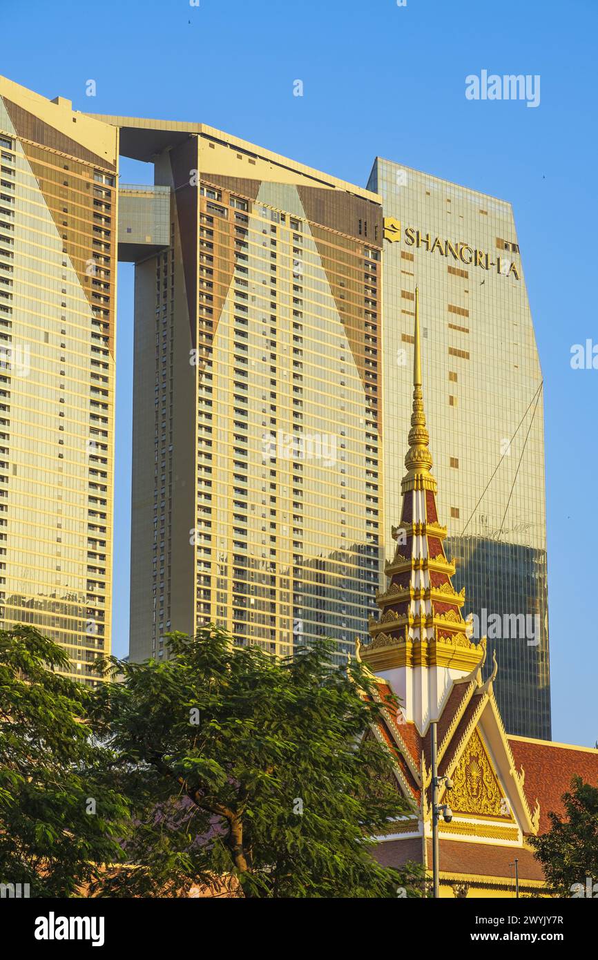 Cambodia, Phnom Penh, the Buddhist Institute and the towers of the Chamkar Mon district Stock Photo