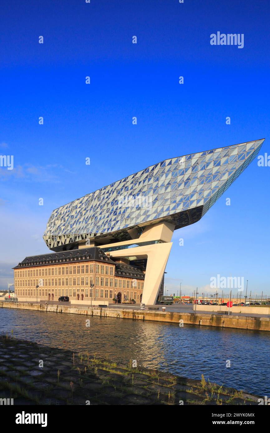 Belgium, Flanders, Antwerp, Port authority house ( (Antwerp Port Authority) is a building from 1922 with a contemporary extension by Zaha Hadid in 2016 Stock Photo
