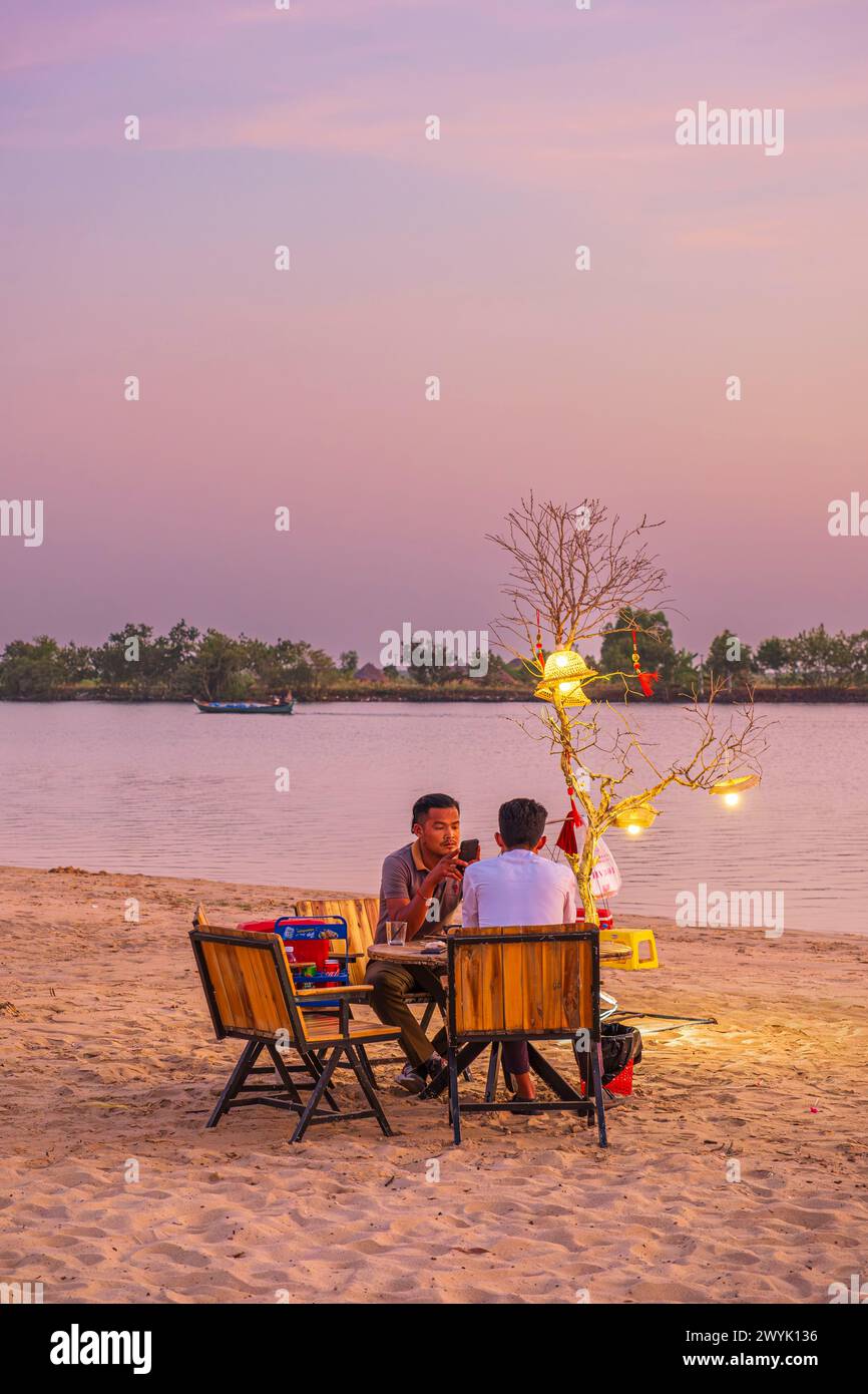 Cambodia, Kampot province, Kampot, Kampong Kandal Sangkat hamlet, beach along Prek Kampong river at dusk Stock Photo