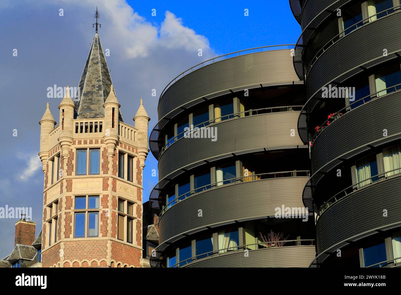 Belgium, Flanders, Antwerp, Ernest Van Dijckkaai, contrast between contemporary building and historic building Stock Photo