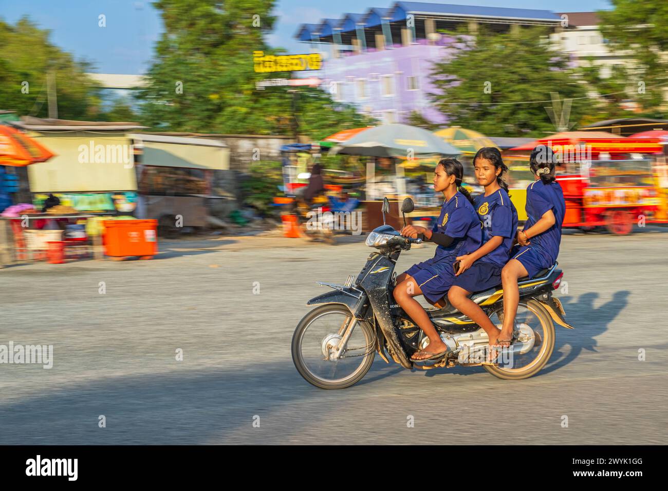 Cambodia, Kampot province, Kampot, young girls on scooter Stock Photo