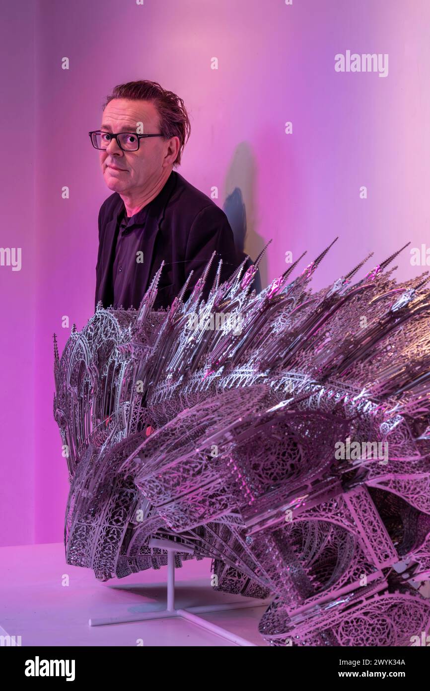 Belgium, East Flanders, Ghent, Studio Wim Delvoye, the artist Wim Delvoye with Twisted Dump Truck, laser-cut stainless steel Stock Photo