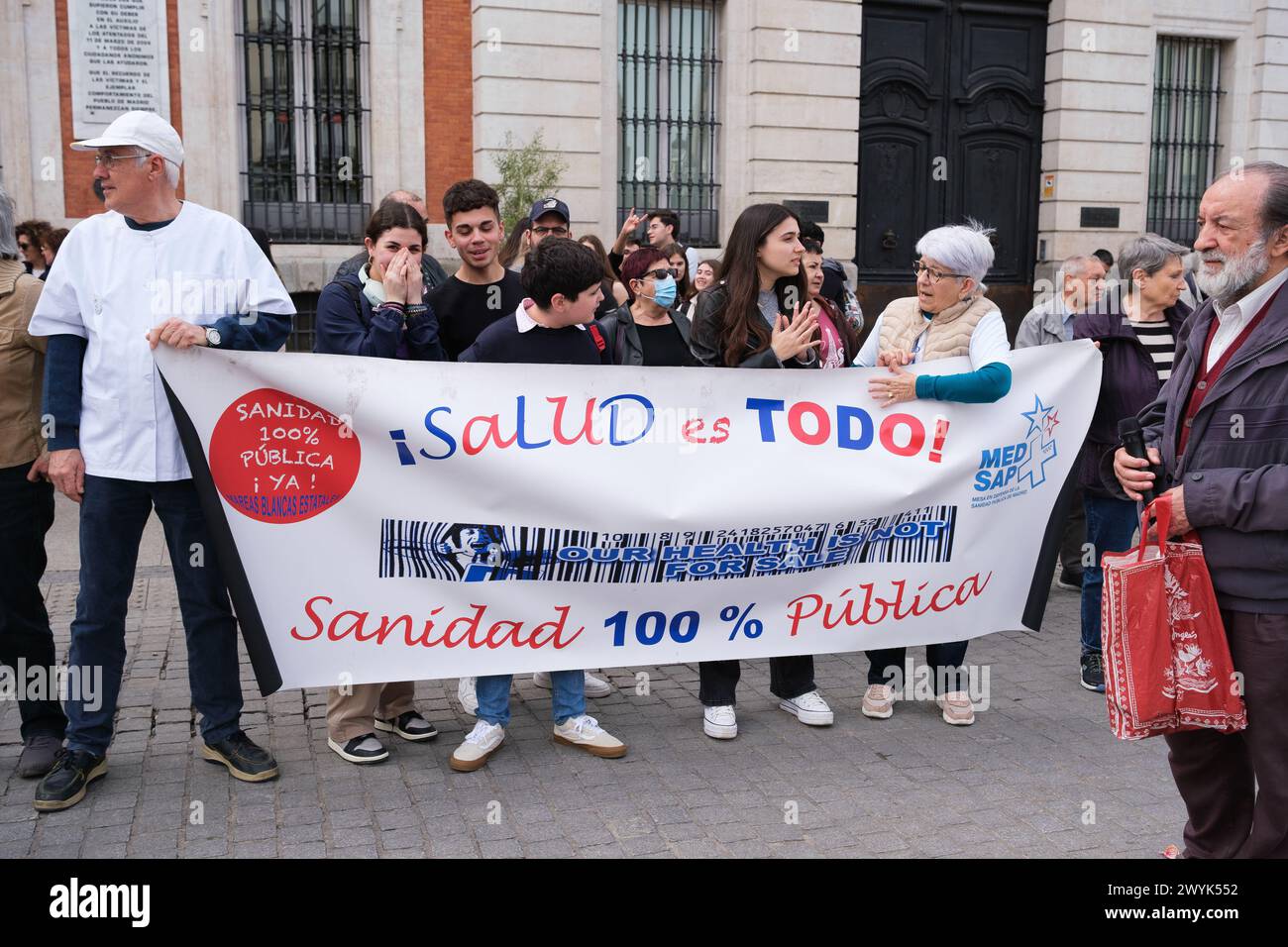 Several people during the rally demanding a 100% public and quality European healthcare system, at Puerta del Sol, on April 7, 2024, in Madrid, Spain. Stock Photo