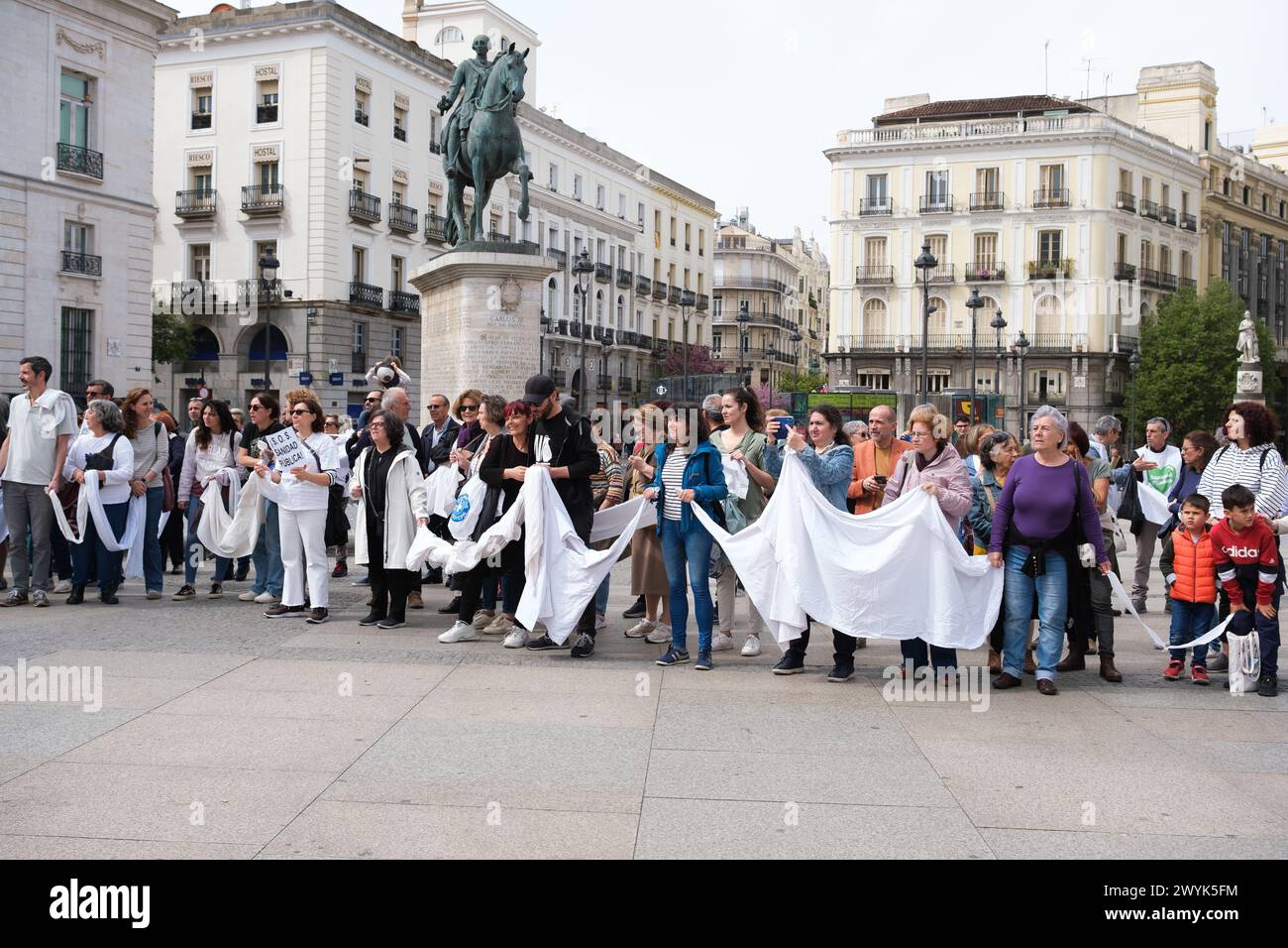 Several people during the rally demanding a 100% public and quality European healthcare system, at Puerta del Sol, on April 7, 2024, in Madrid, Spain. Stock Photo