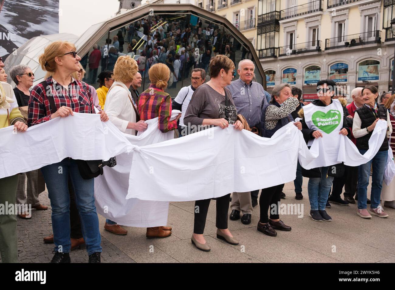 Several people during the rally demanding a 100% public and quality European healthcare system, at Puerta del Sol, on April 7, 2024, in Madrid, Spain. Stock Photo