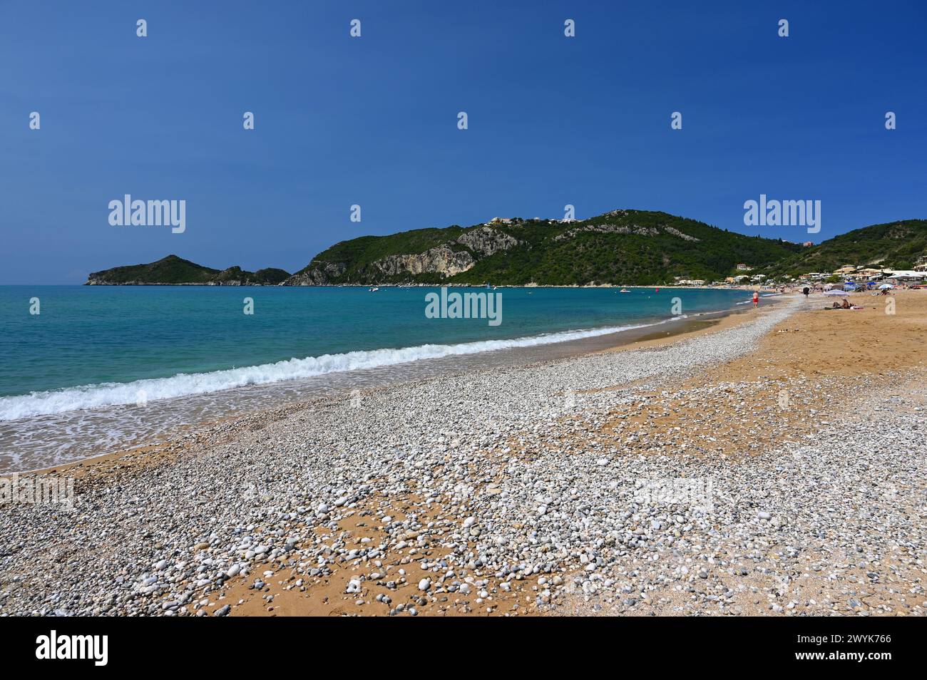 Beautiful beach with sea, sun and blue sky. Concept for travel and summer vacation. Greece-island of Corfu. Agios Georgios beach Stock Photo