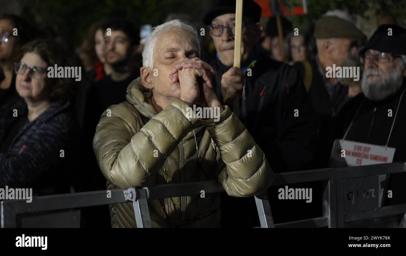 An Israeli woman looks dejected during a demonstration marking hostages’ six months in captivity near PM Benjamin Netanyahu's official residence calling for the release of Israeli hostages held in the Gaza Strip, and against Israeli prime Minister Benjamin Netanyahu and his government on April 6, 2024 in Jerusalem. Israel Stock Photo