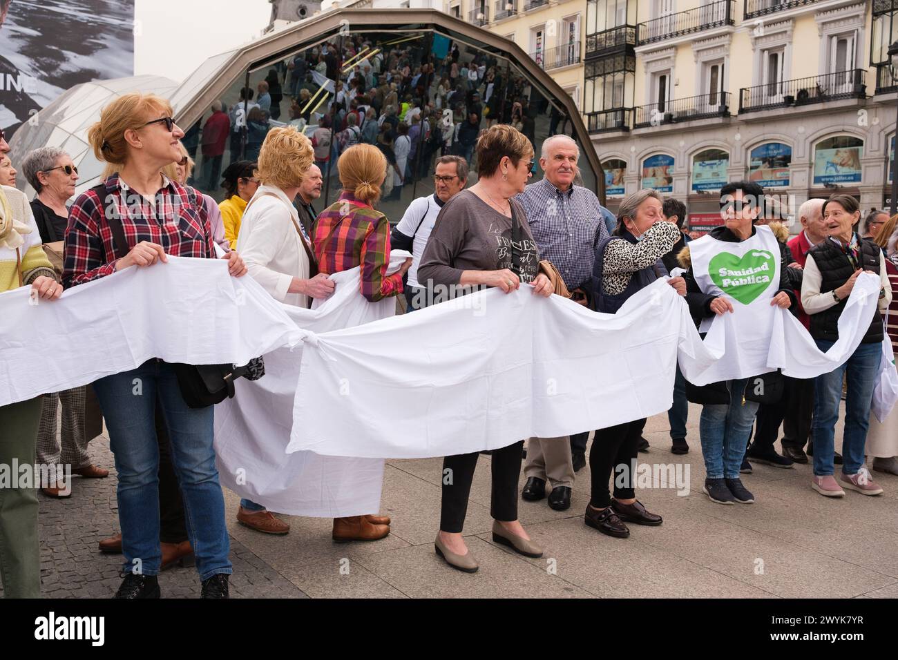 Madrid, Spain. 07th Apr, 2024. Several people during the rally demanding a 100% public and quality European healthcare system, at Puerta del Sol, on April 7, 2024, in Madrid, Spain. (Photo by Oscar Gonzalez/Sipa USA) Credit: Sipa USA/Alamy Live News Stock Photo