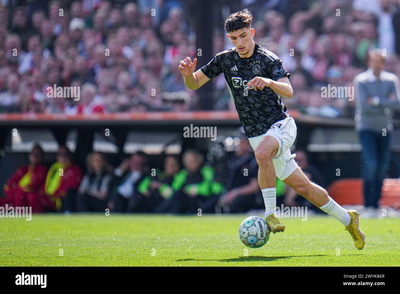 Rotterdam, Netherlands. 07th Apr, 2024. ROTTERDAM, NETHERLANDS - APRIL 7: Ahmetcan Kaplan of AFC Ajax dribbles during the Dutch Eredivisie match between Feyenoord and Ajax at Stadion Feijenoord on April 7, 2024 in Rotterdam, Netherlands. (Photo by Rene Nijhuis/Orange Pictures) Credit: Orange Pics BV/Alamy Live News Stock Photo