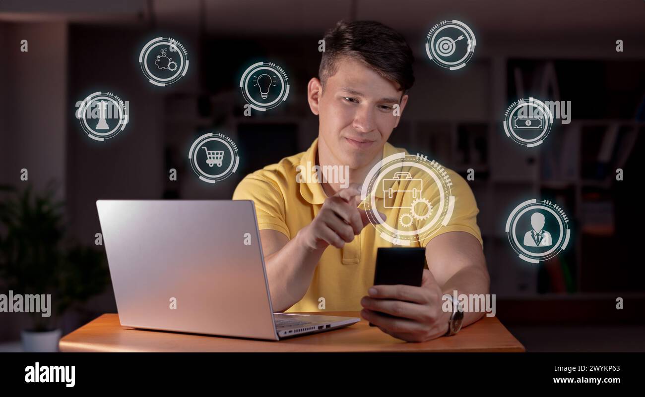 young entrepreneur works in office with intelligence and organization from his electronic devices. business icon concepts Stock Photo