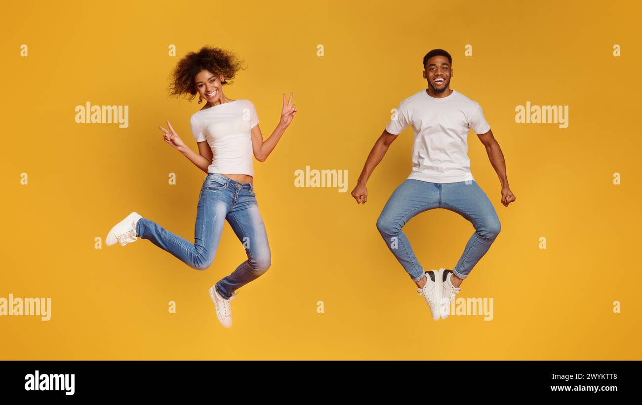 Black couple cheering jumping hi-res stock photography and images - Alamy
