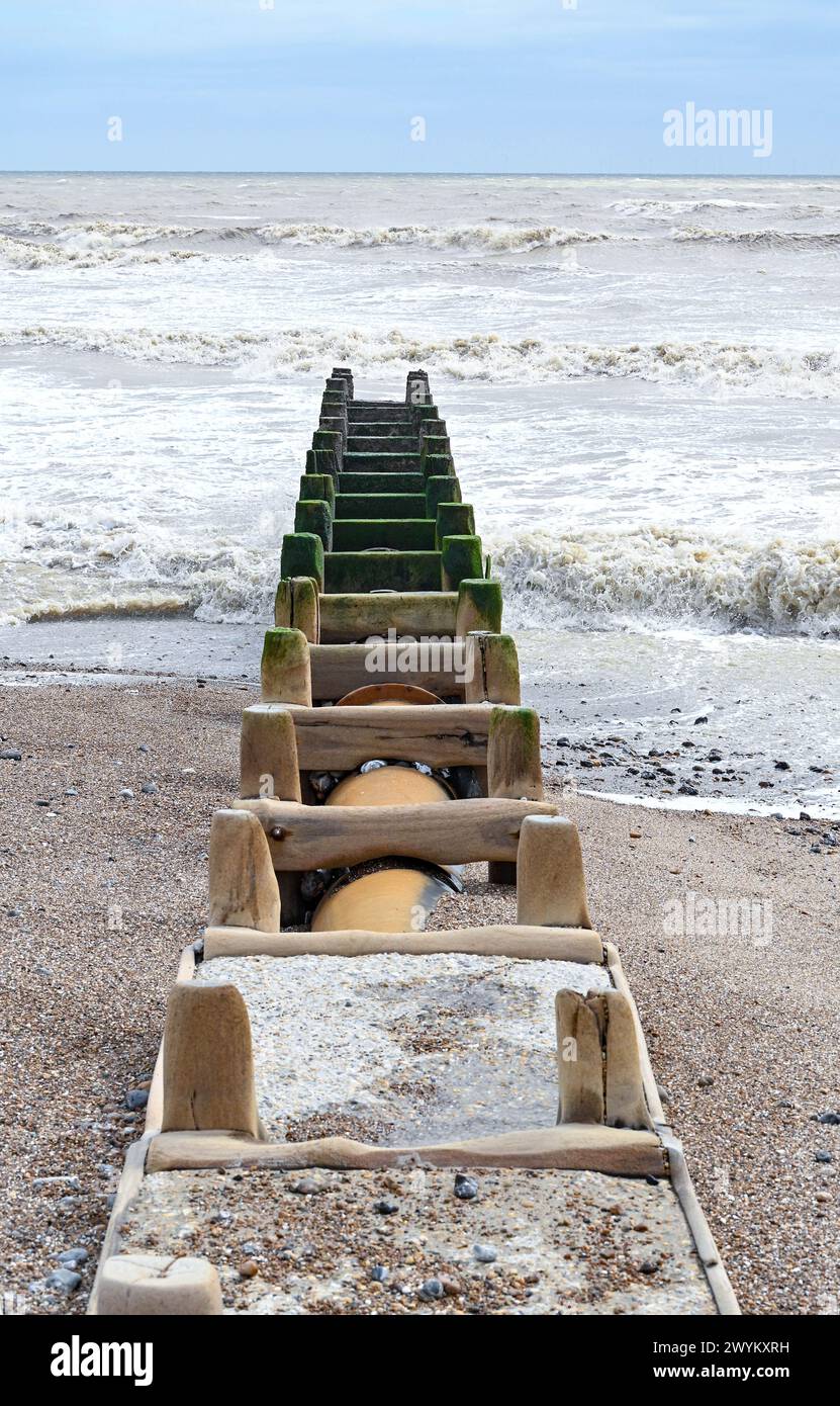 The Southern Water sea outfall pipe at Lancing beach on the Sussex coast between Worthing and Brighton , UK Stock Photo