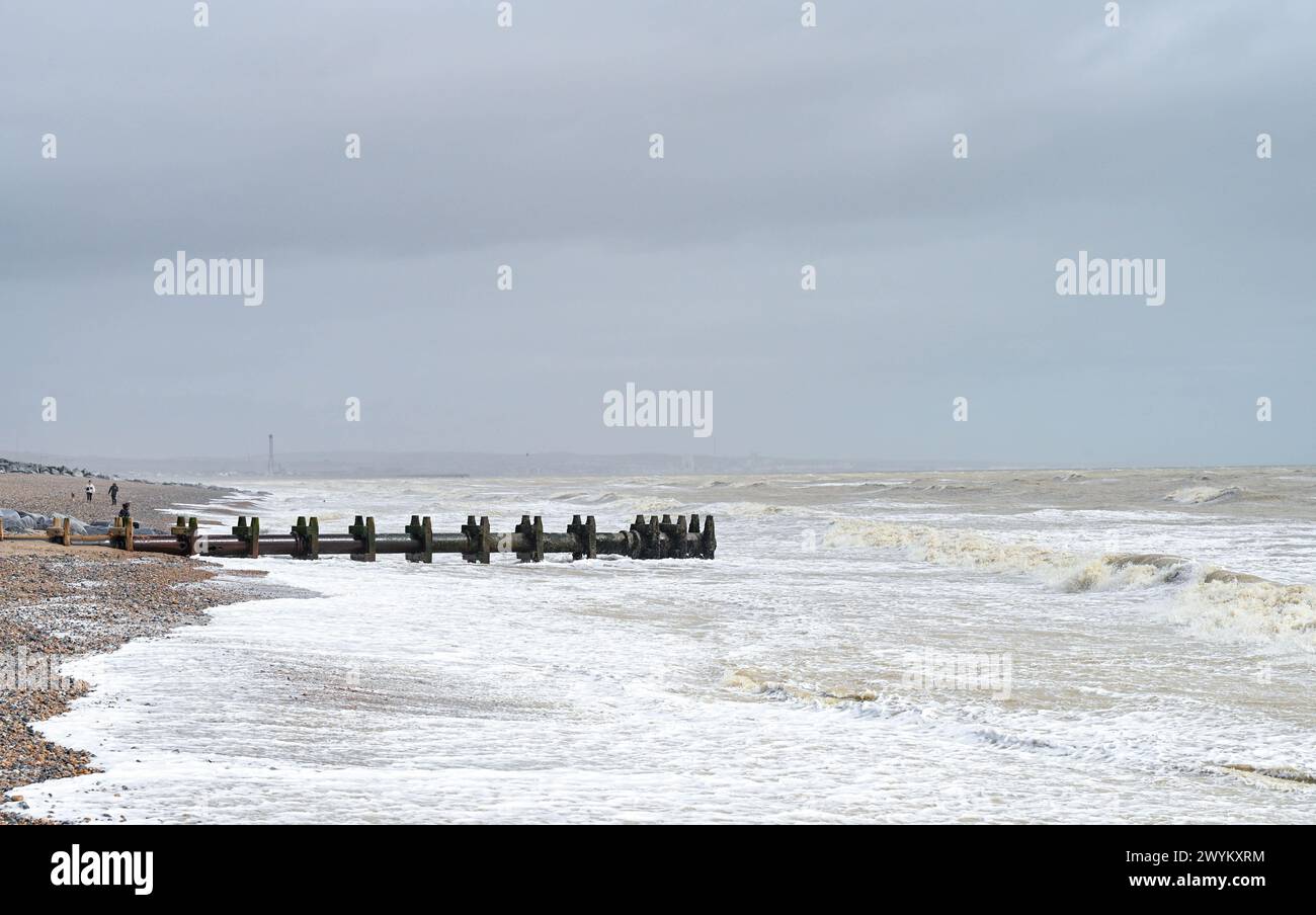 The Southern Water sea outfall pipe at Lancing beach on the Sussex coast between Worthing and Brighton , UK Stock Photo