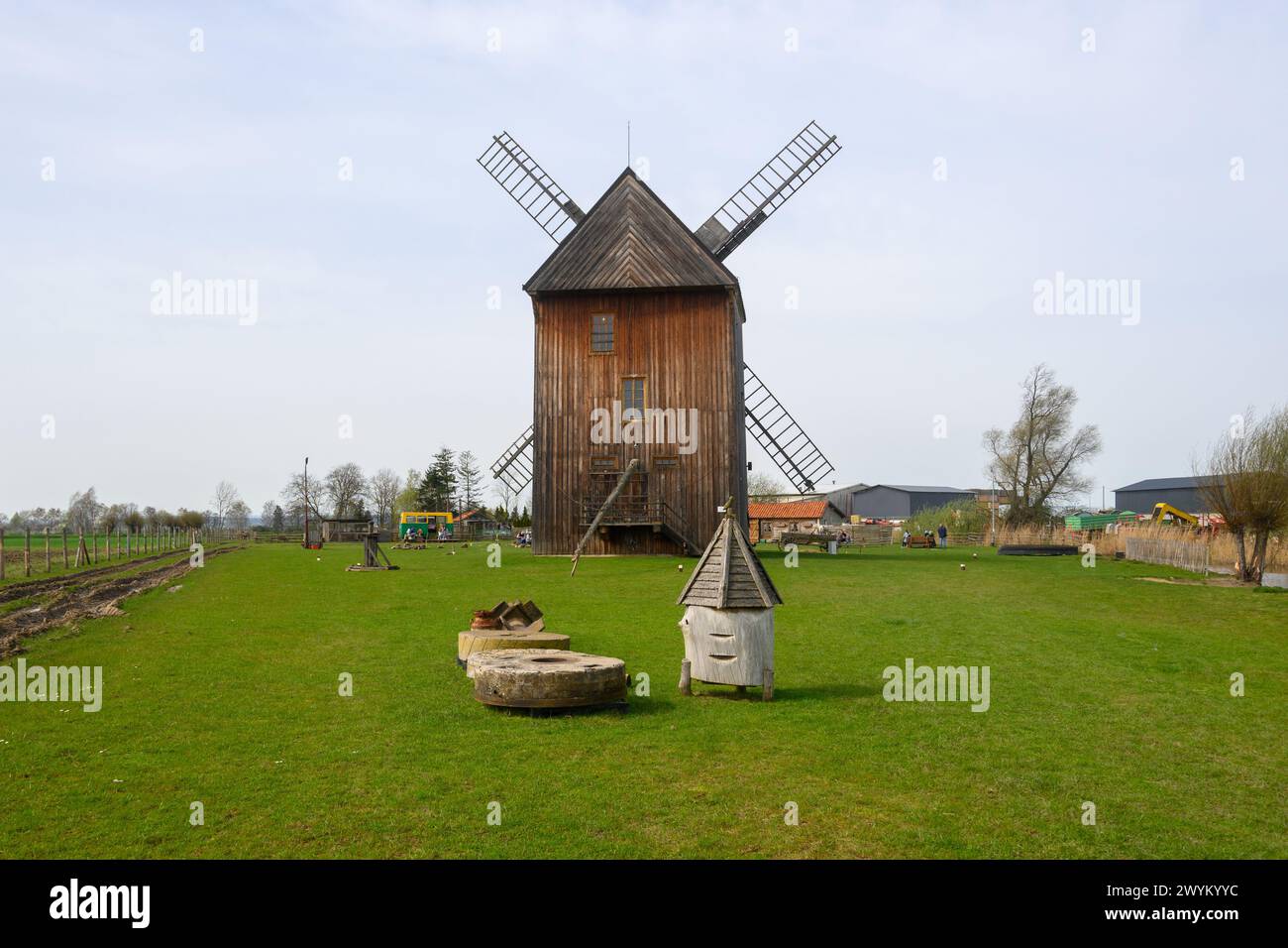 Mokry Dwor, Poland - April 7, 2024: Traditional wooden paltrak windmill in Mokry Dwor village. Educational Farm in Żuławy. Poland Stock Photo