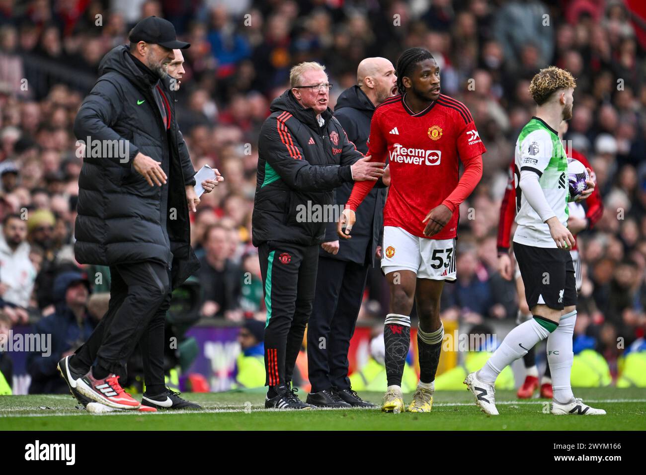 Manchester, UK. 07th Apr, 2024. Manchester, England, Apr 7th 2024: Man Utd Coach Steve McClaren speaks to Willy Kambwala of Man utd during the Premier League football match between Manchester United and Liverpool at Old Trafford in Manchester, England (Will Palmer/SPP) Credit: SPP Sport Press Photo. /Alamy Live News Stock Photo