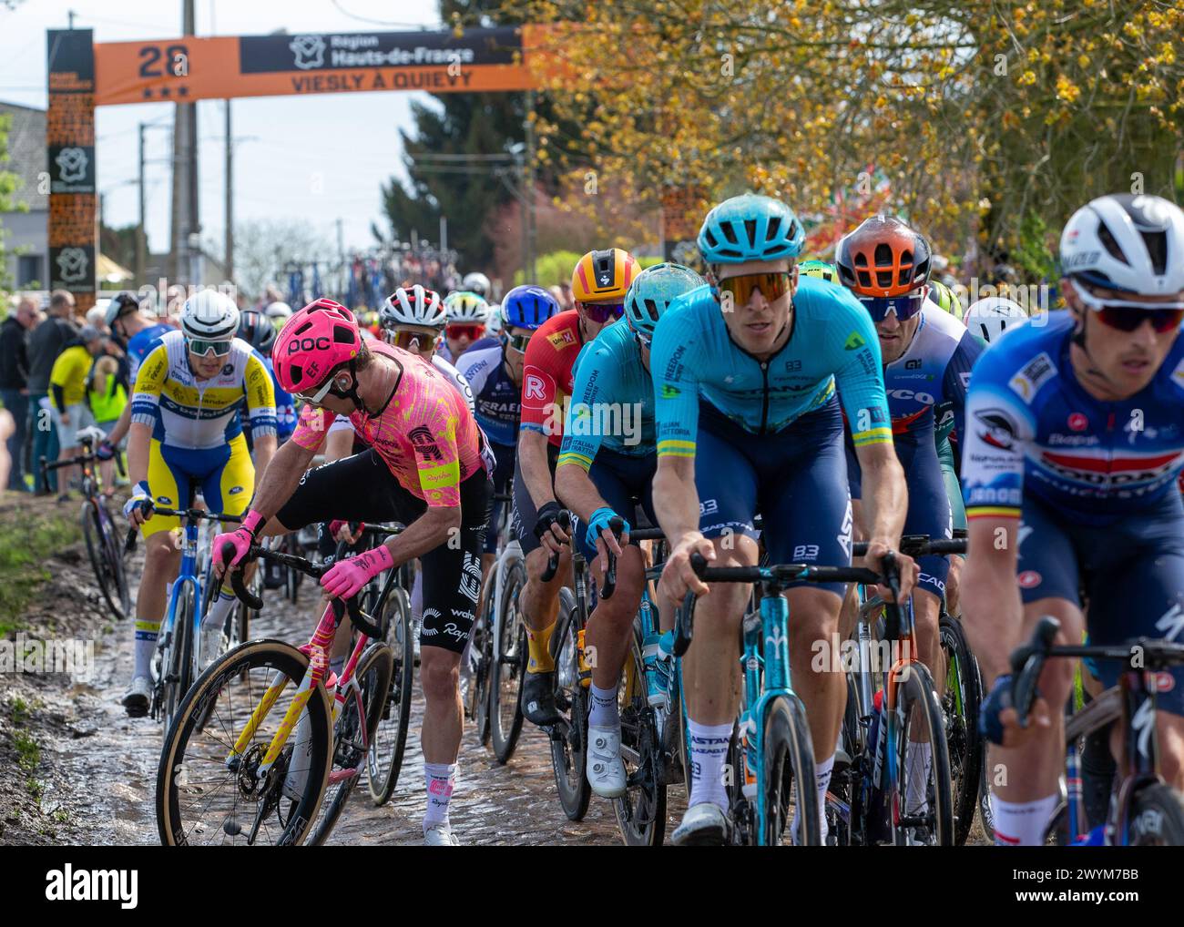 Owain DOULL, EF EDUCATION - EASYPOST sorting his chain out with a mechanical issue during 121st Edition of Paris Roubaix, France, 7th April, 2024, Credit:Chris Wallis/Alamy Live News Stock Photo