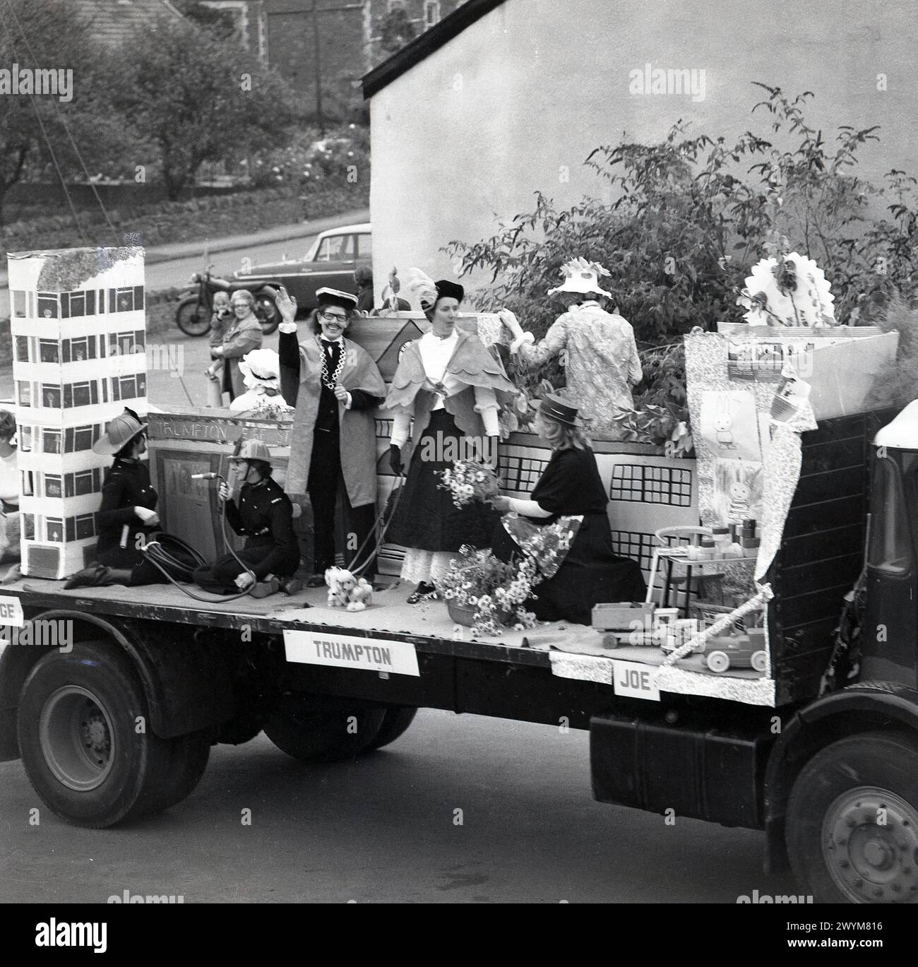 1970s, historical, a float on the back of a truck celebrating the ...