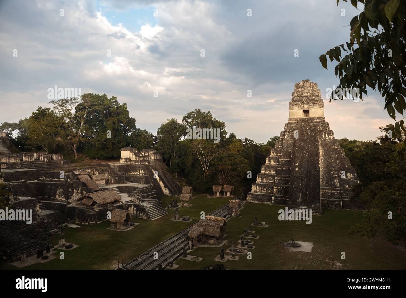 Pyramids and ruins in the Mayan city of Tikal in the jungle of northern Guatemala in the Peten district.  A popular tourism and history attraction Stock Photo
