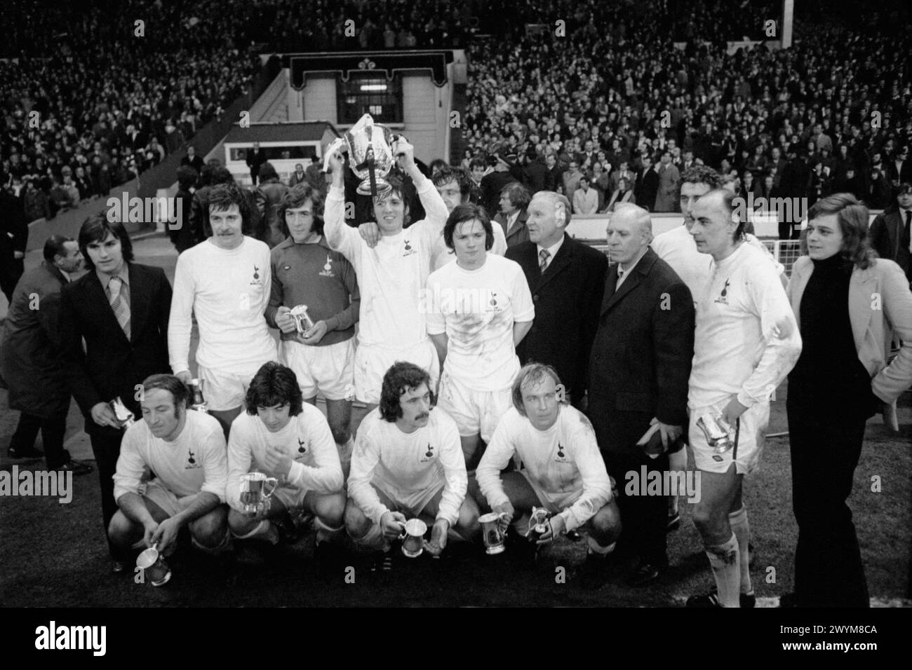 File photo dated 03-03-1973 of Tottenham Hotspur celebrate with the League Cup after their 1-0 win: (back row, l-r) John Pratt, Cyril Knowles, Pat Jennings, Martin Peters, Mike England, Steve Perryman, manager Bill Nicholson, ?, Martin Chivers, Alan Gilzean; (front row, l-r) Ralph Coates, Joe Kinnear, Terry Naylor, Phil Beal. Former Tottenham defender and Wimbledon manager Joe Kinnear has died at the age of 77, has family have announced in a statement. Issue date: Sunday April 7, 2024. Stock Photo