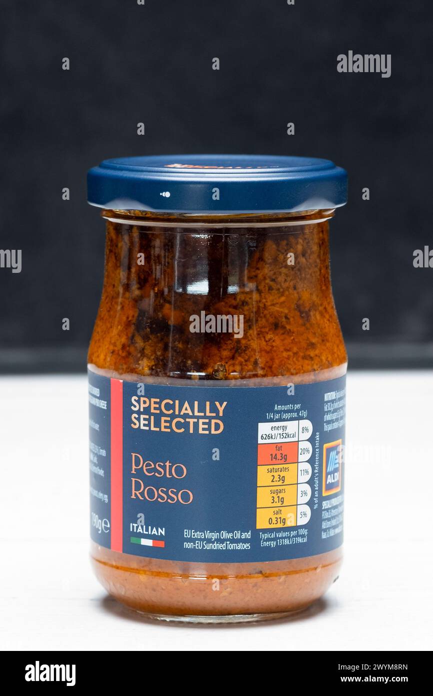 Irvine, Scotland, UK March 26, 2024 Jar of Aldi branded Pesto Rosso
