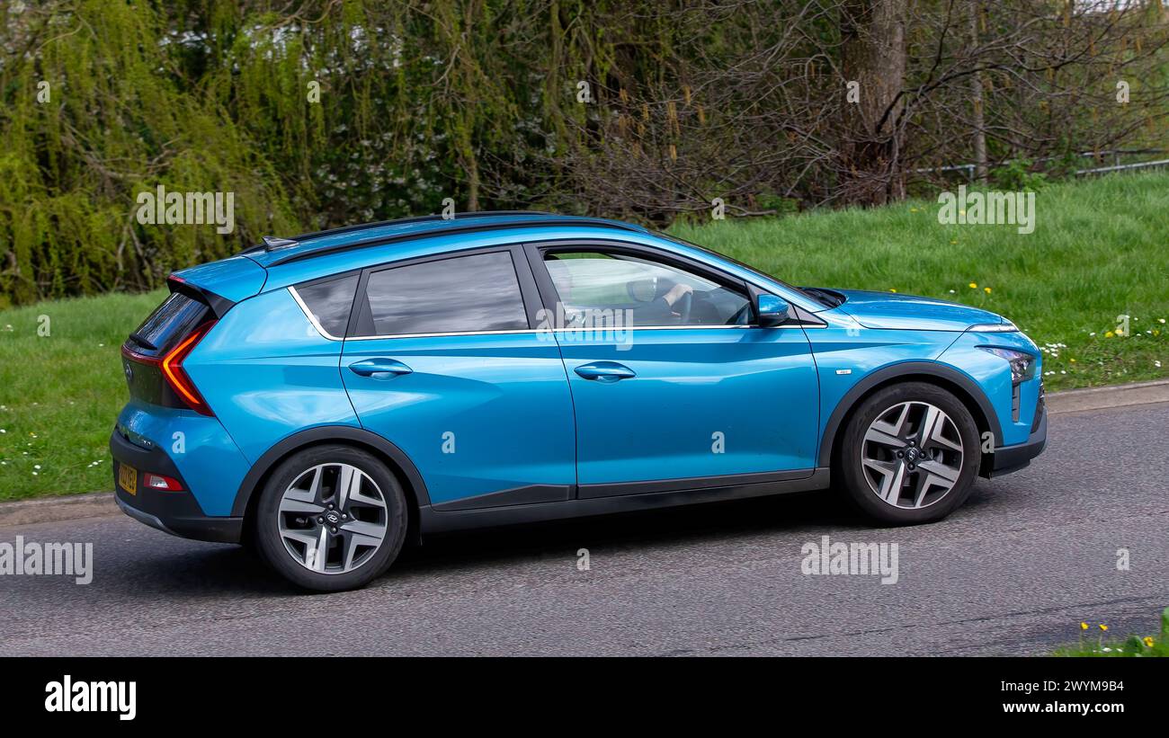 Milton Keynes,UK- Apr 1st 2024: 2023 turquoise hybrid electric Hyundai Bayon  car driving on a British road Stock Photo