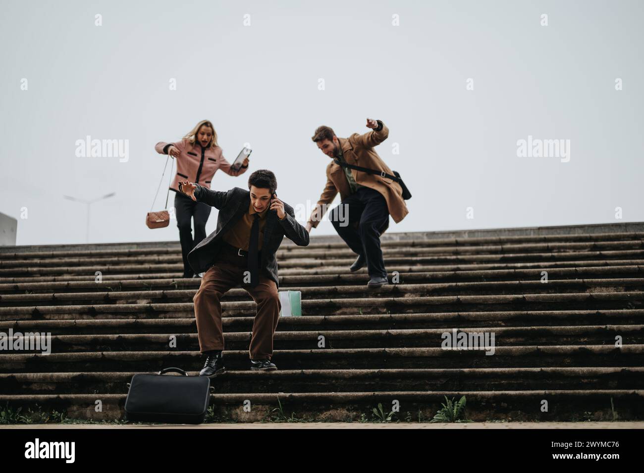 Two People Getting Steps In Group young people climbing steps hi-res stock photography and images ...
