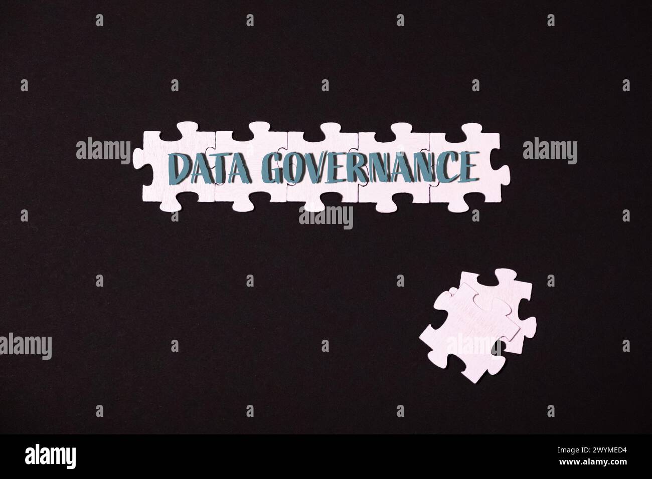 A jigsaw puzzle with the words Data Governance written on it Stock Photo