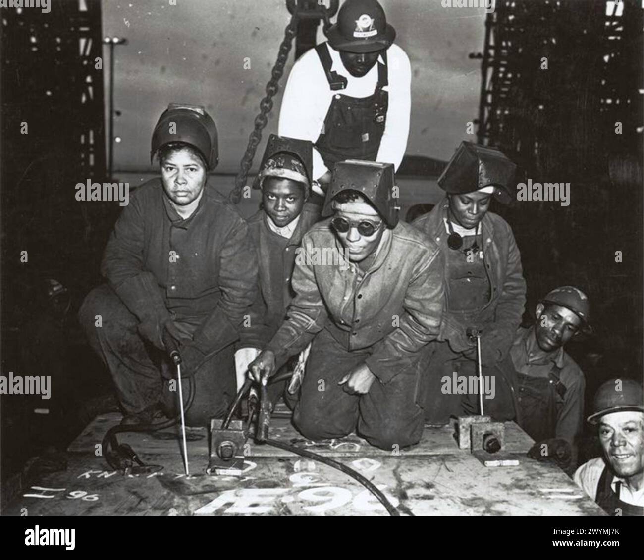 African American women, employed to work on the Liberty ship SS George Washington Carver, holding scalers, Kaiser Shipyards, Richmond, California, ca. 1943 Stock Photo