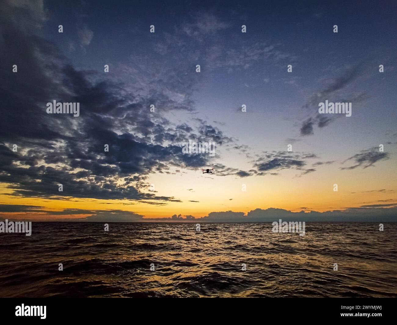 Flying drone at sea hi-res stock photography and images - Alamy