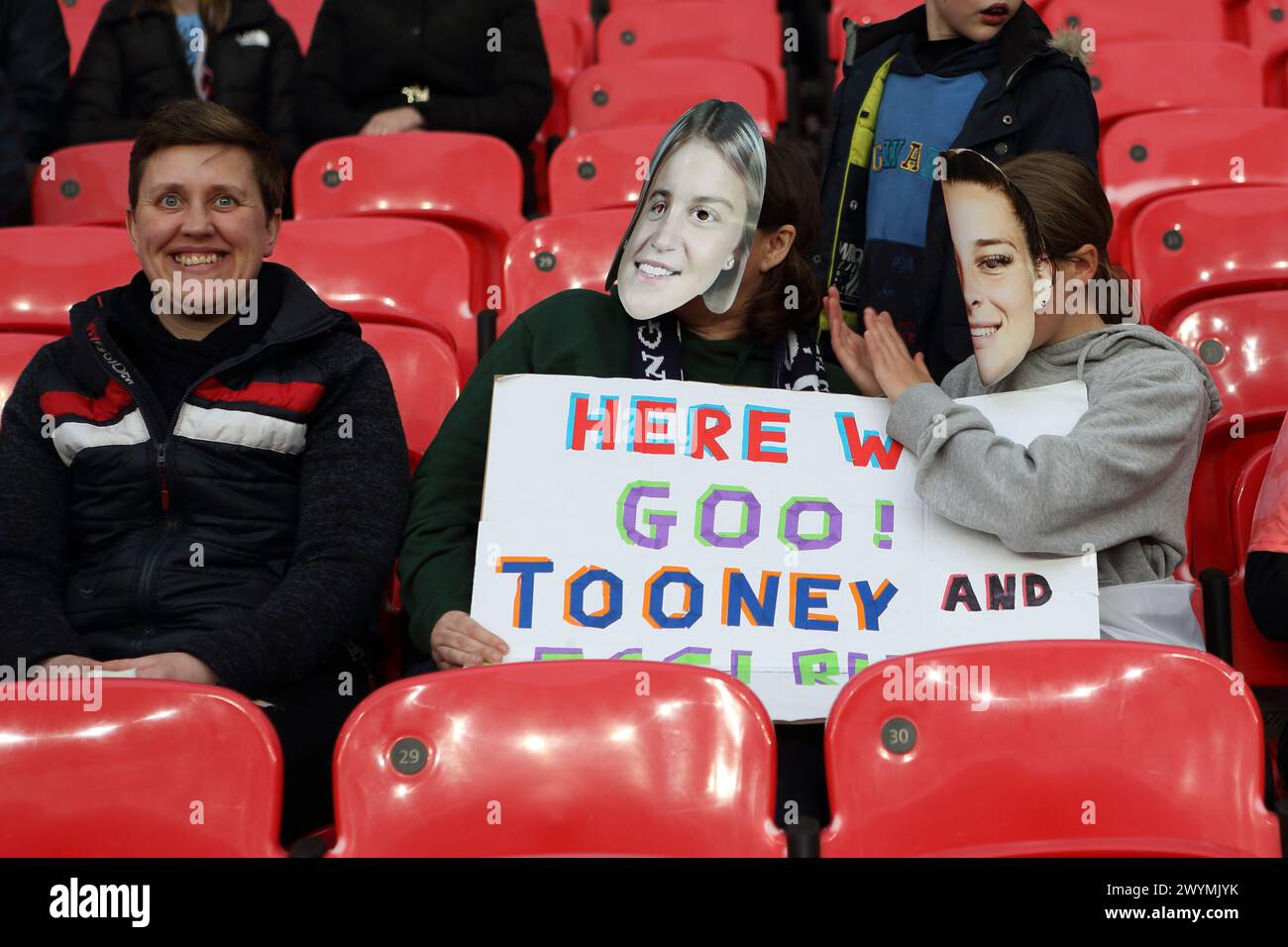 Fans with placard masks Tooney and Lessi Ella Toone Alessia Russo England v Sweden UEFA Women's Euro Wembley Stadium, London, 5 April 2024 Stock Photo