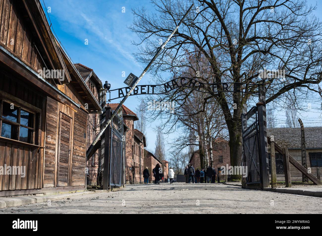 Auschwitz, Poland, March 21, 2024 - Entrance of the concentration camp with the Arbeit macht frei quote, meaning Work makes one free Stock Photo