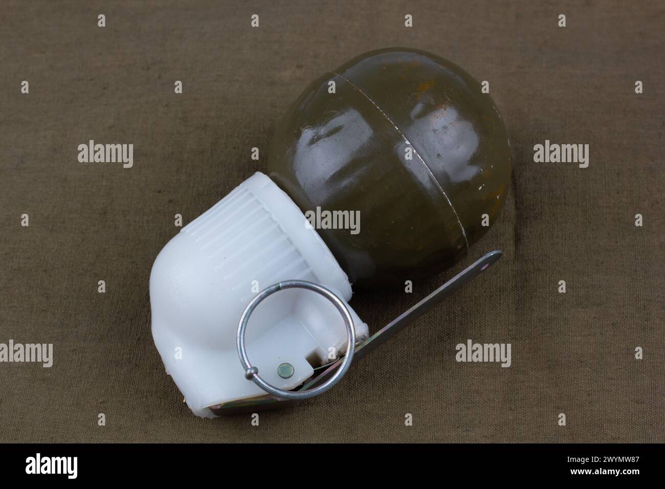 Soviet hand grenade RGN on khaki canvas background Stock Photo - Alamy