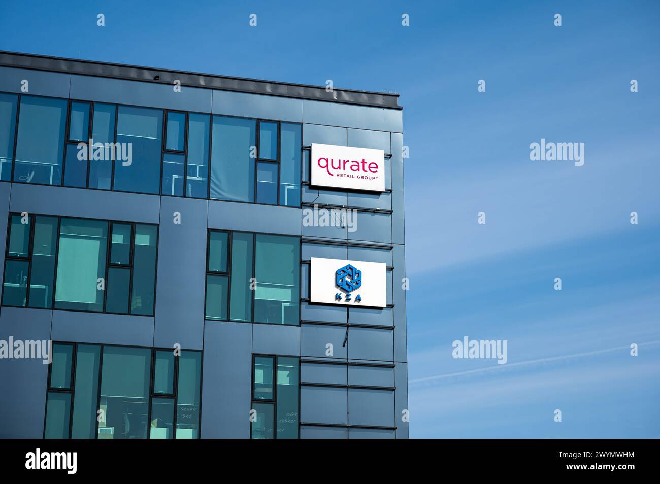Krakow, Lesser Poland, March 19, 2024 Facade and sign of the Qurate