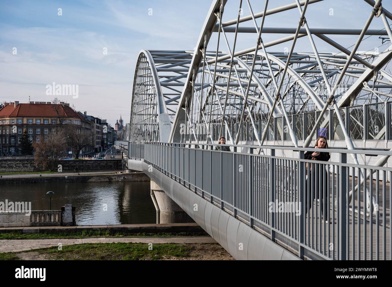 Krakow, Lesser Poland, March 19, 2024 - The cycling path of the Zabłocie-Grzegórzki Bridge over the river Wisla Stock Photo
