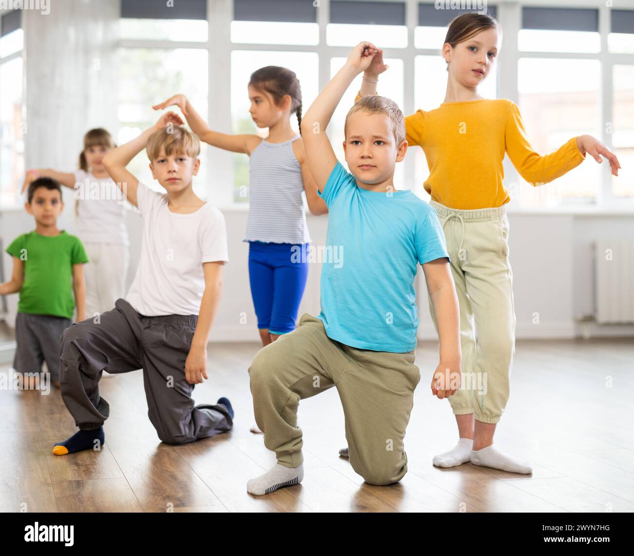 Girl paired up with boy, they train to perform slow waltz dance ...