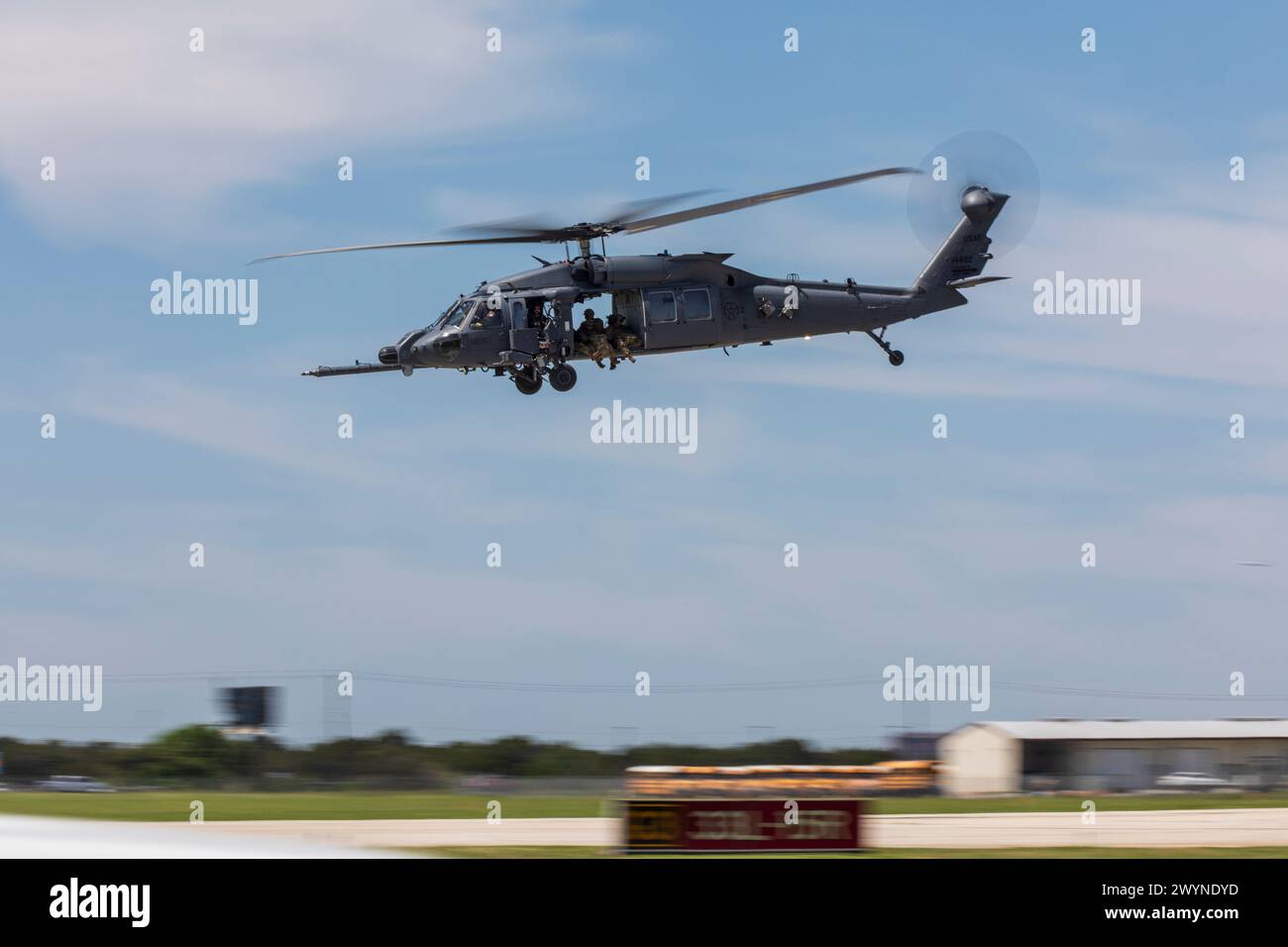 A U.S. Air Force HH-60 Pave Hawk performs at Joint Base San Antonio-Randolph, Texas for The Great Texas Airshow practice day, April 5, 2024. The HH-60 demo is just one of many aerial and ground performers that participated in the airshow to accompany static displays, educational booths, vendors, and kids’ zone. The performances and displays at the airshow highlight the pride, precision and professionalism the U.S. Air Force represents. (U.S. Air Force photo by Joseph Kumzak). Stock Photo