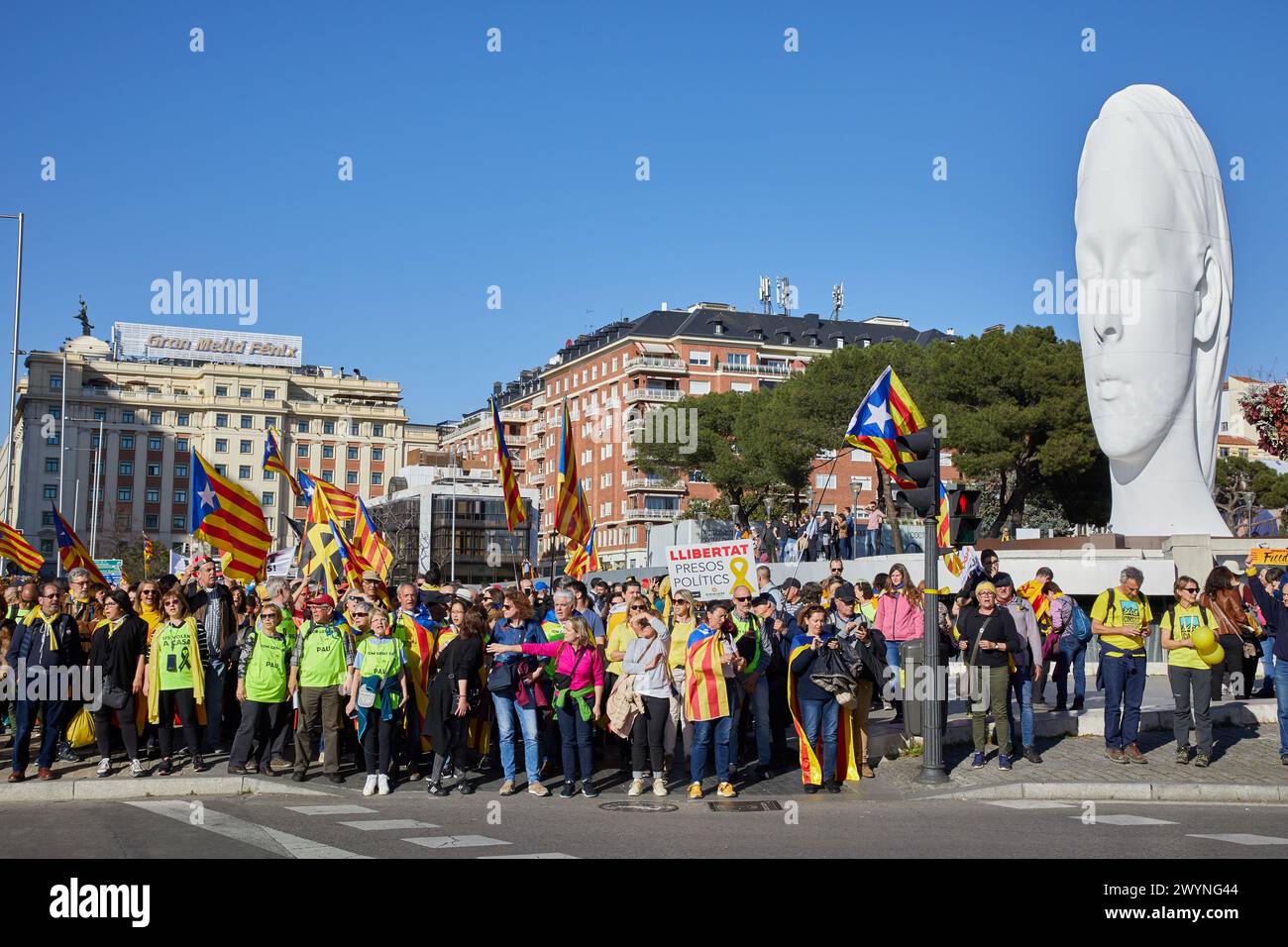 Manifestation of Catalans demanding independence, Flags of Catalonia, 'Julia', sculpture by Jaume Plensa, Colon Square, Madrid, Spain, Europe. Stock Photo