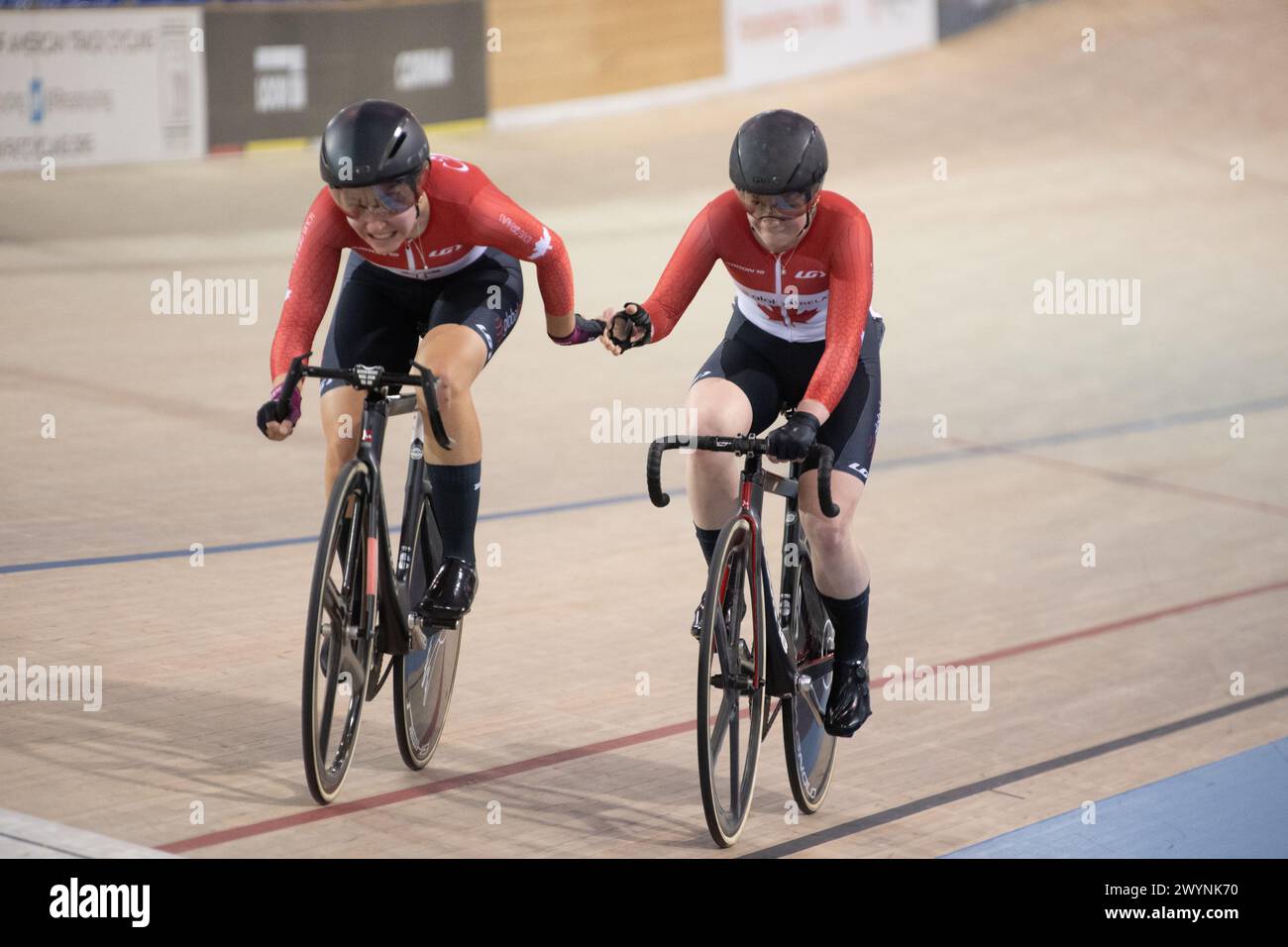 Los Angeles, California, USA. 7th Apr, 2024. The Canadian women's madison team of Ngaire Barraclough and LIly Plante make an exchange, and would finish in third place for the bronze medal. Credit: Casey B. Gibson/Alamy Live News Stock Photo
