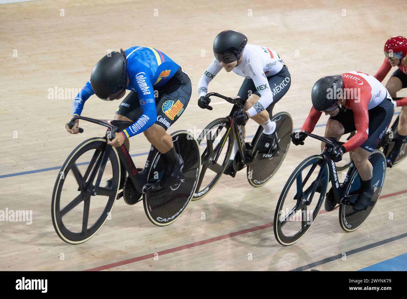 Los Angeles, California, USA. 7th Apr, 2024. Martha Bayona Pineda of Colombia(L, leads Daniela Gaxiola Gonzalez of Mexico and Lauriane Genest of Canada in the final of the women's keirin. Pineda would win the gold medal. Credit: Casey B. Gibson/Alamy Live News Stock Photo
