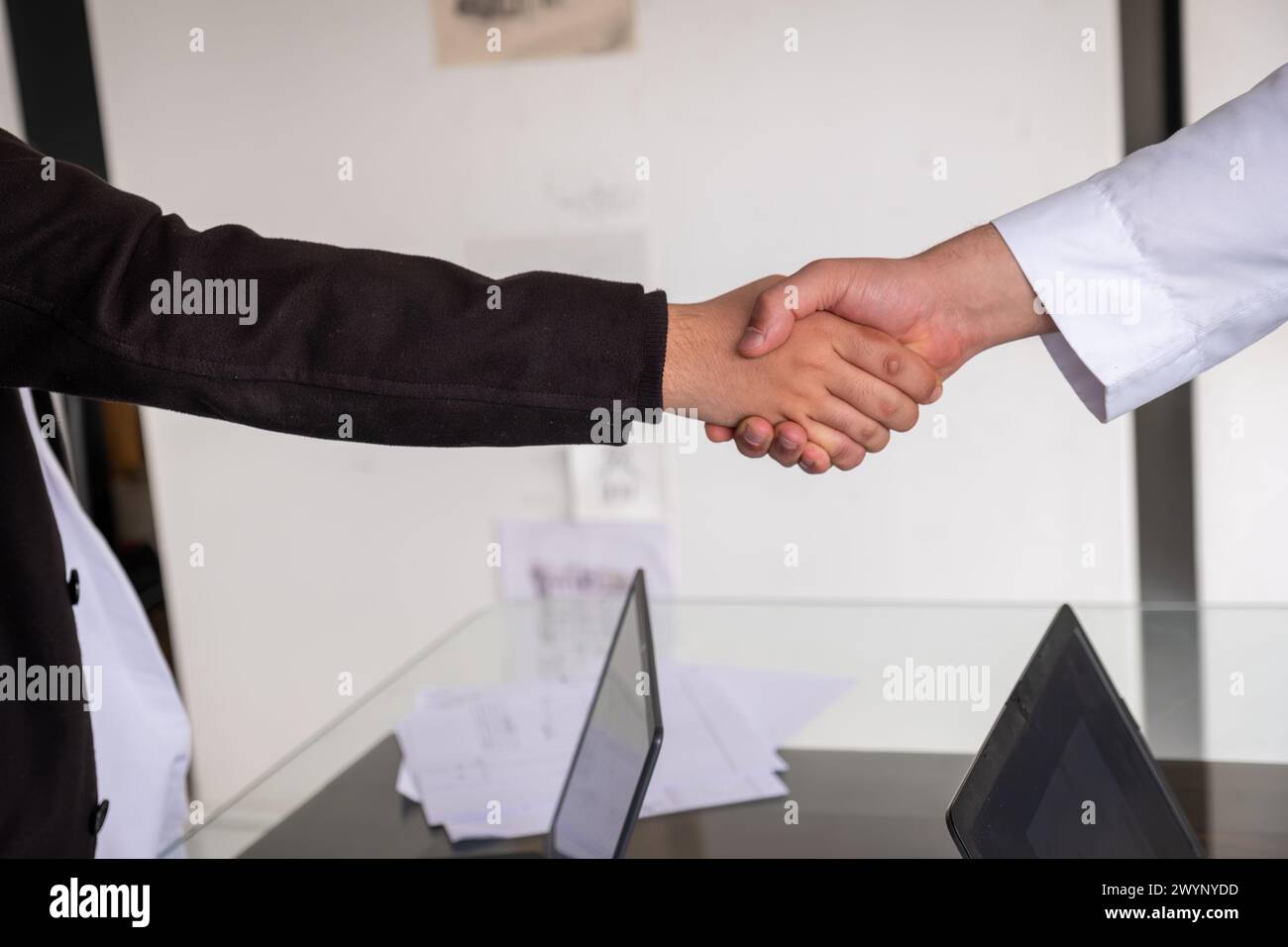 Arab shaking hands friendly and lovely Stock Photo