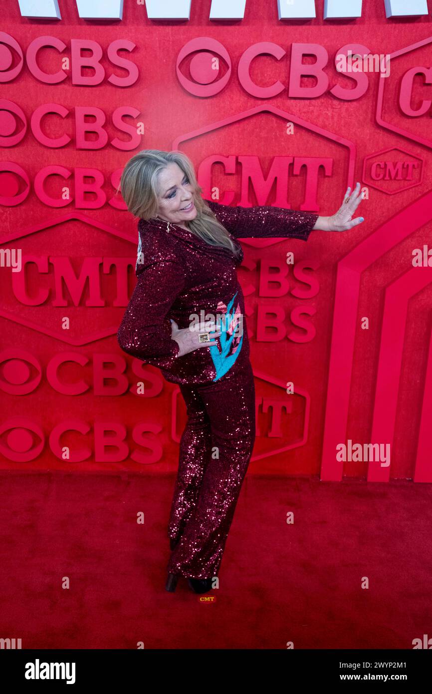 Country singer CARLENE CARTER walks the red carpet and poses for