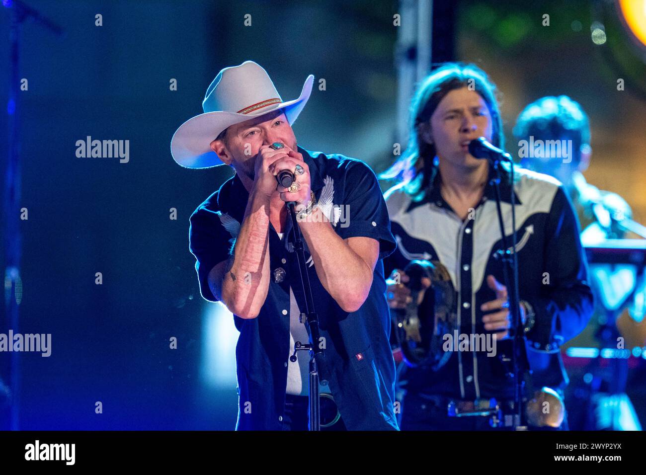 Austin, Tx, USA. 5th Apr, 2024. American country rock band NEEDTOBREATHE with lead singer BEAR RINEHART performs at a taping of CMT Country Crossroads in front of the University of Texas Tower on April 5, 2024. At right is bassist SETH BOLT (Credit Image: © Bob Daemmrich/ZUMA Press Wire) EDITORIAL USAGE ONLY! Not for Commercial USAGE! Stock Photo