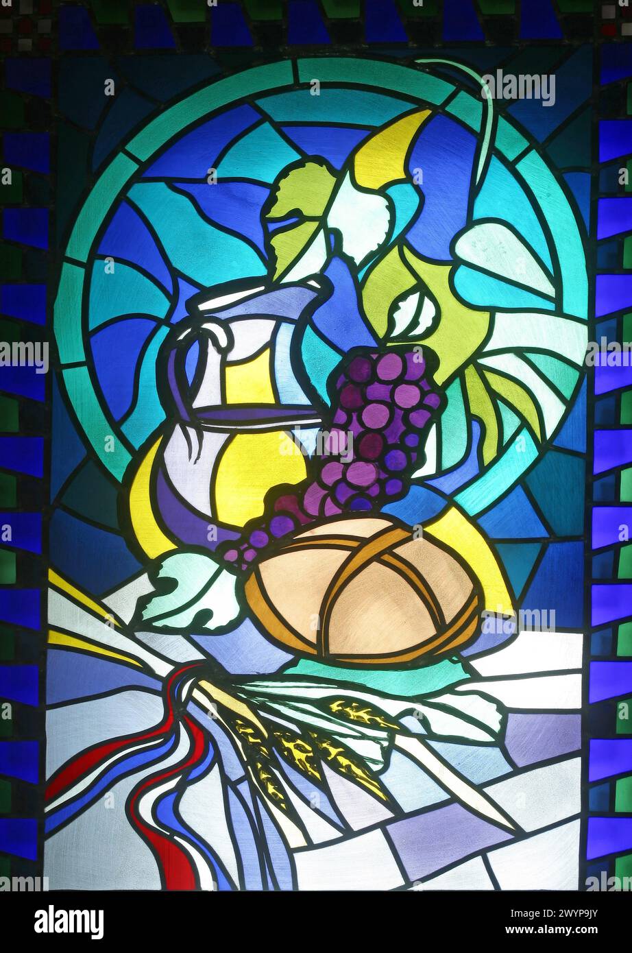 Eucharist, stained glass window in the parish church of the Exaltation of the Holy Cross in Kerestinec, Croatia Stock Photo