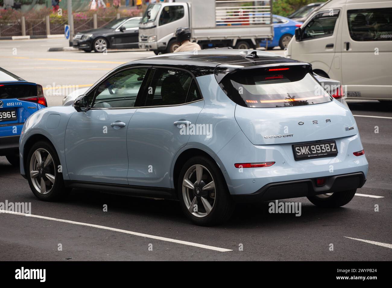 45 degree back side view of ORA Good Cat Electric vehicle in celestial blue / starry black colour. Singapore. Stock Photo