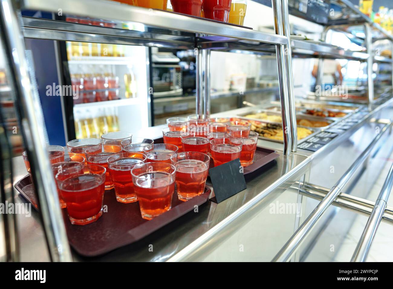 Colorful Array of Fruit Juice Cups on a Serving Cart in a Cafeteria ...
