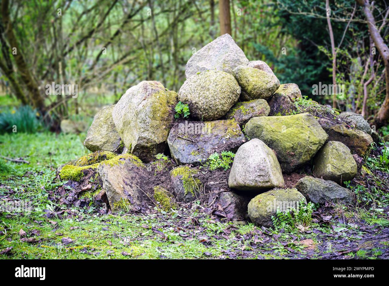 Ecological stone pile, a natural paradise in the garden, small caves and niches offer hiding places, protection and habitat for many animals, copy spa Stock Photo