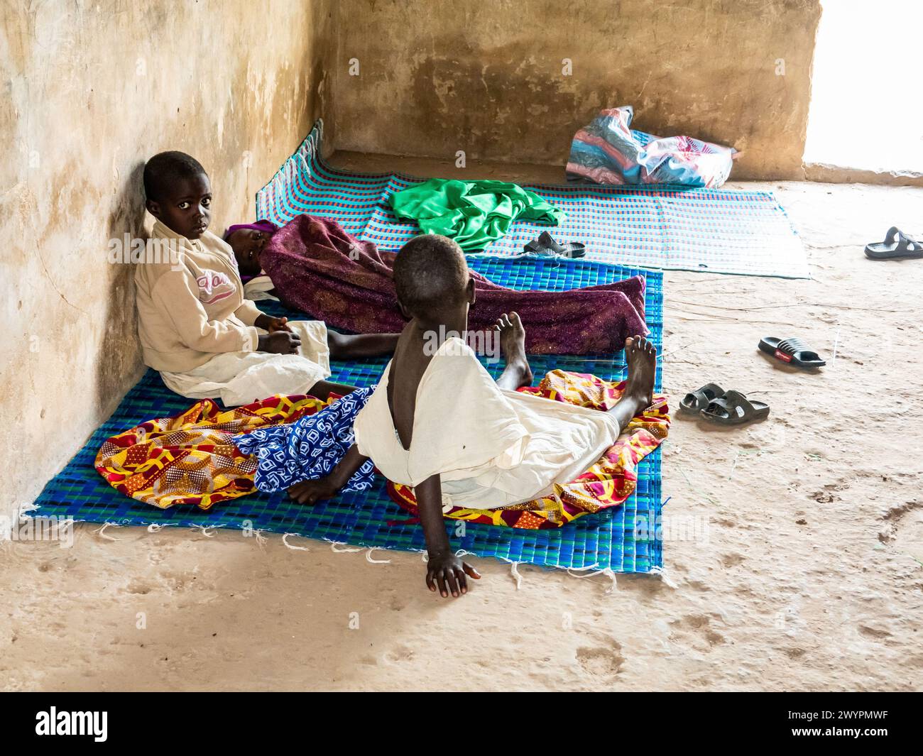 MBOUR, SENEGAL - CIRCA MARCH 2021. Unidentified teenager oor african ...