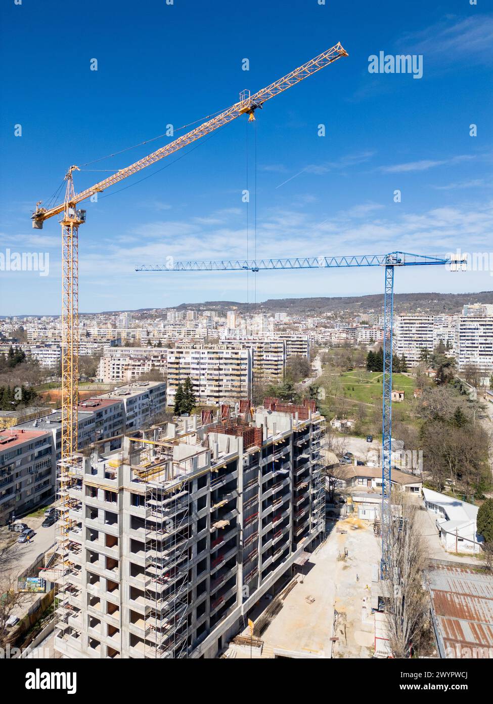 Busy Construction Site With Cranes and Buildings Stock Photo - Alamy