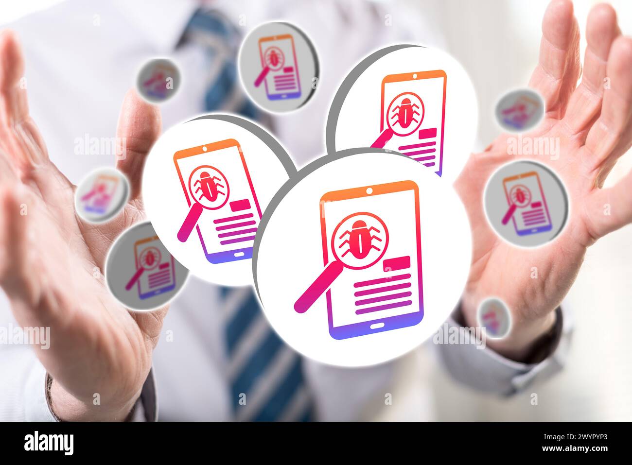 Software testing concept between hands of a man in background Stock Photo