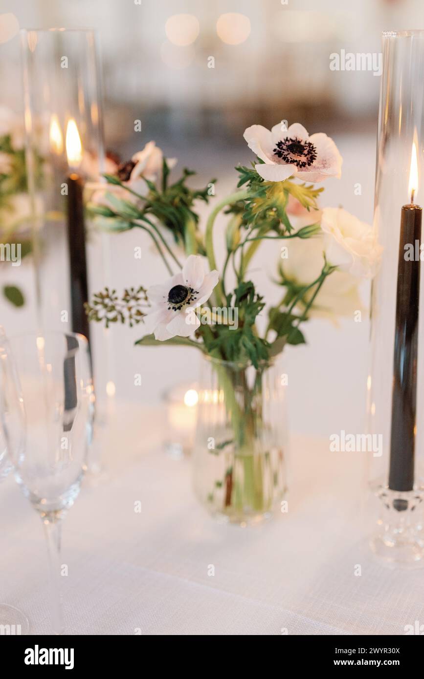 Intimate wedding table setting with anemones Stock Photo